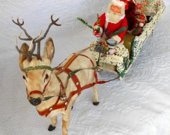 NO ES UN JUGUETE REAL Recorte navideño vintage de Papá Noel y reno con trineo. Declaración. Leer descripción.