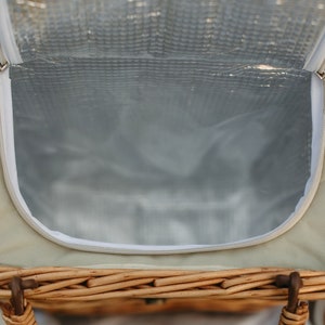 The waterproof and easy to clean liner makes this basket function as an insulated picnic basket cooler.