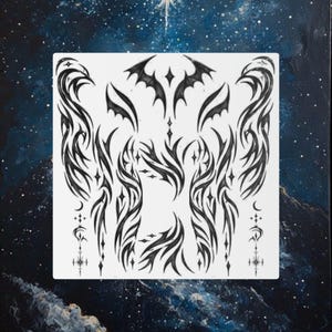 May include: A square sheet of temporary tattoos featuring black ink designs on a white background. The patterns include symmetrical tribal-style swirls, bat wings, small crescent moons, and four-pointed stars arranged in a decorative layout.