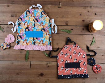 Toddler Double-Sided Reversible Aprons with a Pair of Coordinating Hair Scrunchies - 2 Options