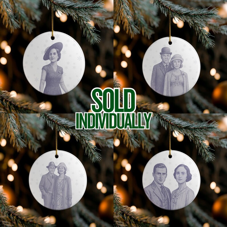 May include: White ceramic Christmas ornaments with vintage-style portraits of people, hanging from a Christmas tree. The ornaments have gold string hangers. The text "SOLD INDIVIDUALLY" is in green and white. Each ornament features a different portrait.