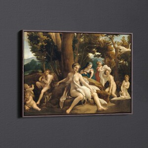 May include: A painting depicting a group of figures in a wooded setting. A woman sits on a rock with a swan beside her. Other figures are standing or sitting nearby. The painting is framed in a brown frame.