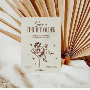 May include: A birthday party invitation with a retro illustration of a woman in a martini glass. The text reads "She's a Tini Bit Older" and includes the date, time, and location of the party.