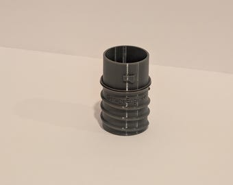 Adapter for Hercules 12 Gallon OSHA-Compliant HEPA Dust Extractor to use a 2.5" wire coil extractor hose.