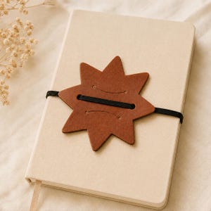 Portalápices de cuero para cuaderno, con lazo elástico en forma de estrella para bolígrafo.
