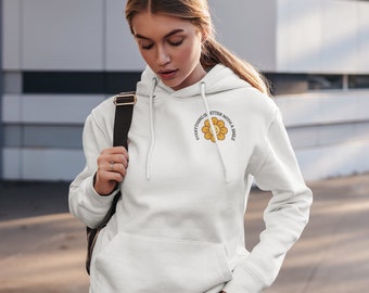May include: White hoodie with a yellow flower graphic and the text "Everything is better with a smile".