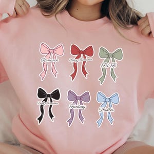 Coquette bow book genre stickers featuring Romance, Spicy Romance, Sci-Fi, Dark Academia, Fantasy, and Thriller designs in soft aesthetic colors for planners, reading journals, and BookTok inspired decor.