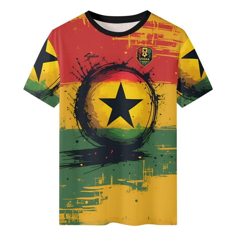 May include: A short-sleeved t-shirt featuring the Ghana flag design. The shirt has a black crew neck and a design that includes a large black star inside a black circle, with the colors red, yellow, and green. The Ghana emblem is on the upper right.