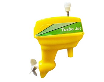 vintage 70's Yellow Turbo Jet Outboard Motor Toy Wind Up Propeller Novelty Small