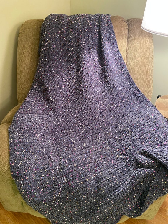 Grey flecked crocheted blanket