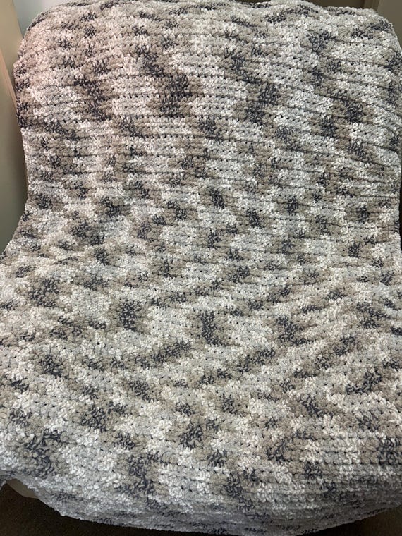 Grey variegated crochet blanket