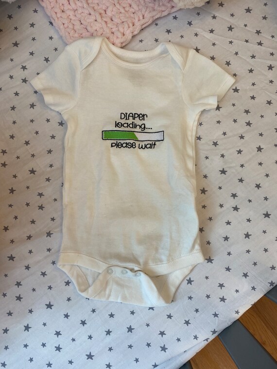 Embroidered diaper loading onesie