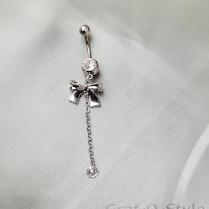 Charming Bow Belly Button Ring with Dangling Chain Accent