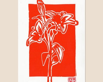 May include: A rectangular print featuring a bold red block background with a white line art illustration of a lily flower stem. The design includes two blooming lilies and leaves, with a small red square seal containing white Chinese characters.