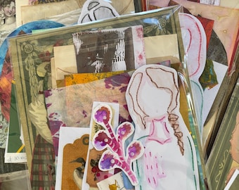 May include: Assortment of vintage ephemera, including paper scraps, stamps, and illustrations, packaged in clear plastic. The collection features a variety of colors and textures, with a focus on botanical and portrait imagery. Some items have price tags.