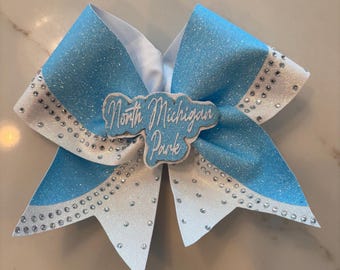 Custom bow, glitter, rhinestone accents, name center, personalized name.