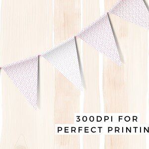 May include: A white bunting with pink polka dots hangs against a woodgrain background. The text "300DPI FOR PERFECT PRINTING" is printed below the bunting.