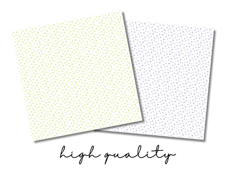 May include: Two sheets of paper with a repeating pattern of small dots. One sheet is light yellow with green dots, and the other sheet is light blue with purple dots.