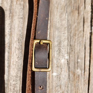 Leather powder horn strap with buckle and leather ties