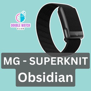 May include: Black Superknit watch band with a textured pattern. The band has a black clasp with the letter "W" on it. The text "MG - SUPERKNIT Obsidian" is displayed below the watch band.