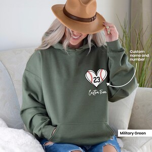 Personalized Baseball mom Hoodie pocket design for women baseball Heart Sweatshirt for sports mom Custom Baseball Fan Gifts