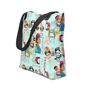 May include: A light blue tote bag featuring a repeating pattern of Frida Kahlo portraits, flowers, and the words "Create," "Pasion," and "Vive La Vida." The bag has a black strap and is made of a durable material.
