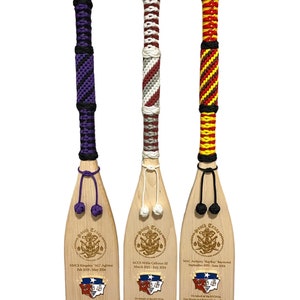 36 in paddle wrapped with 2 or more colors. A military farewell gift. Engraving Logo/personal message available.