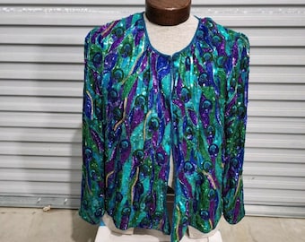 Chaqueta vintage de los años 80 de Past Times, con estampado de pavo real, lentejuelas y cuentas, talla XL. Nunca usada.