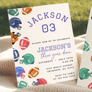 May include: Two football-themed invitations. One features the name "JACKSON" and "03" with event details. The other has a pattern of footballs and helmets in blue, green, orange, and red. The invitations are on a cream-colored background.
