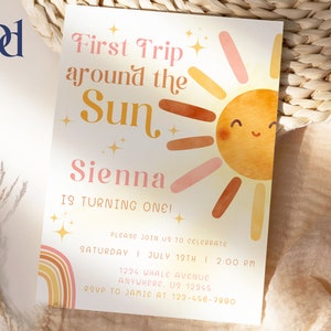 May include: A colourful invitation with a sun illustration and the text "First Trip around the Sun Sienna is turning one!" Please join us to celebrate Saturday, July 19th at 2:00 PM. 1234 Whale Avenue, Anywhere, US 12345. RSVP to Jamie at 123-456-7890.