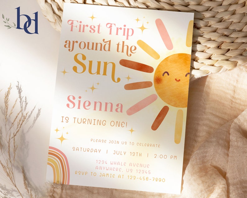 May include: A colourful invitation with a sun illustration and the text "First Trip around the Sun Sienna is turning one!" Please join us to celebrate Saturday, July 19th at 2:00 PM. 1234 Whale Avenue, Anywhere, US 12345. RSVP to Jamie at 123-456-7890.