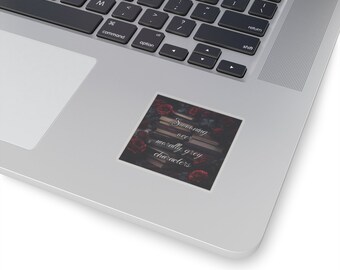 May include: A sticker with a dark background featuring a stack of books with red roses around them. The text on the sticker reads "Swooning over morally grey characters."