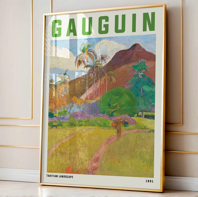 May include: Framed art print of a Gauguin painting, featuring a vibrant Tahitian landscape. The artwork displays a path leading through a field, with palm trees, mountains, and a figure carrying a load. The text "GAUGUIN" and "TAHITIAN LANDSCAPE 1891" are visible.
