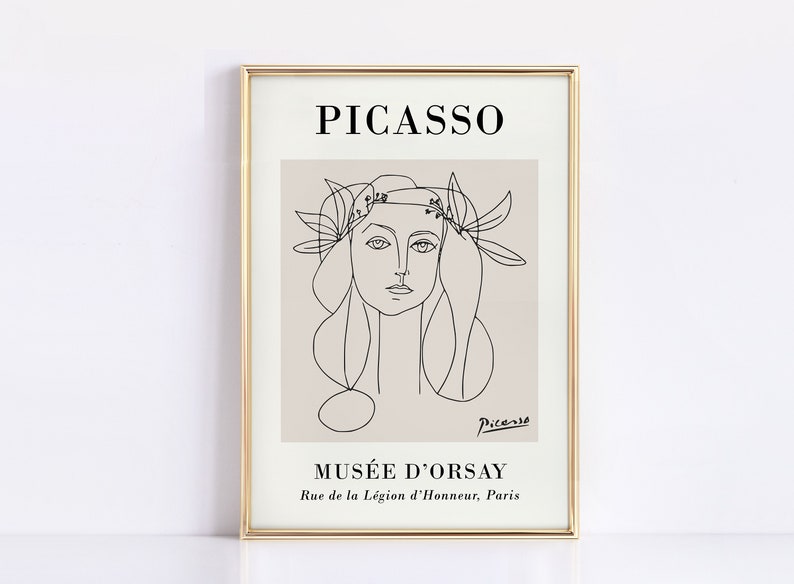 Puede incluir: Una impresi&oacute;n art&iacute;stica enmarcada con un dibujo lineal del rostro de una mujer, con el nombre "Picasso" en la parte superior. La impresi&oacute;n est&aacute; en un marco dorado e incluye el texto "Mus&eacute;e d'Orsay" y la direcci&oacute;n en Par&iacute;s.