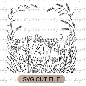 Op de afbeelding: Zwart-wit lijntekening van wilde bloemen en grassen, die een rand vormen. Het ontwerp bevat verschillende bloemsoorten en tarwe, met de tekst "SVG CUT FILE" onderaan.