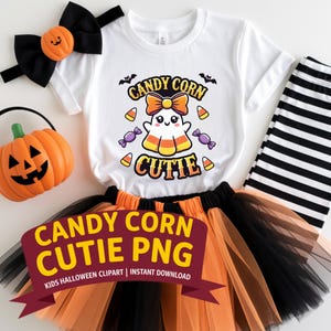 May include: A white t-shirt with a cute ghost wearing a candy corn costume and the text "Candy Corn Cutie". The shirt is part of a Halloween outfit for kids, also including a black and orange striped leggings and a tulle skirt.