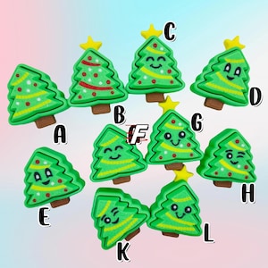 May include: Ten green Christmas tree decorations with different facial expressions. Each decoration has a yellow star on top and red and green details.