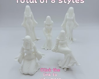 May include: A collection of eight white ghost figurines in various poses. The figures are draped in flowing fabric, with veiled faces. The text "Total of 8 styles" and "Click the link to view more" are displayed in pink.
