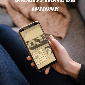 May include: A smartphone with a gold-colored frame displays architectural drawings and the text "READ IT ON YOUR SMARTPHONE OR IPHONE". The phone is held by a person wearing blue jeans.