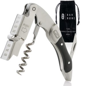May include: A stainless steel corkscrew with a black handle and a built-in bottle opener. The corkscrew has a worm for extracting corks and the words "BAR NONE" are engraved on the opener. A black drawstring bag with the text "BAR NONE THE CORKSTRACTER PRO" is also included.
