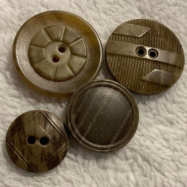 4 Interesting Tan Composition Buttons. Antique. Varying Sizes and Designs.