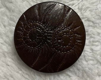 Dark Brown Embossed VI Antique Button. A Little Over 1 1/8 Inch.