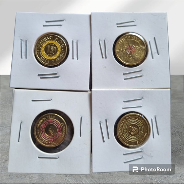 A 4 coin  collection of some Australian coloured coins including the 2023 2 vegitmite coin plus 2020 fire-fighter coin and 2 2020 games