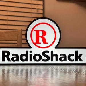 Scatola luminosa con logo Radio Shack