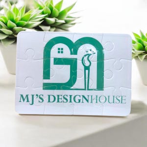 custom 12-piece puzzle featuring white background with mint green company business logo