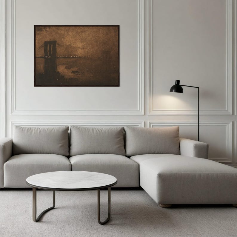May include: A sepia-toned photograph of the Brooklyn Bridge at night, with the city skyline in the background. The bridge is silhouetted against the dark sky, and the lights of the city are reflected in the water.