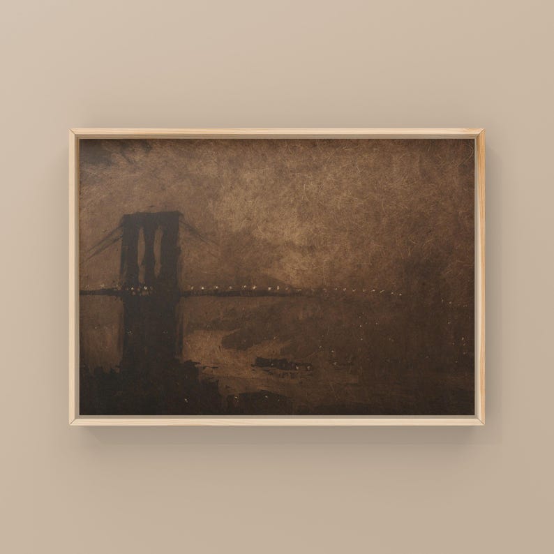 May include: A framed painting of a dark silhouette of a bridge against a brown, cloudy sky. The bridge is lit with small white lights.