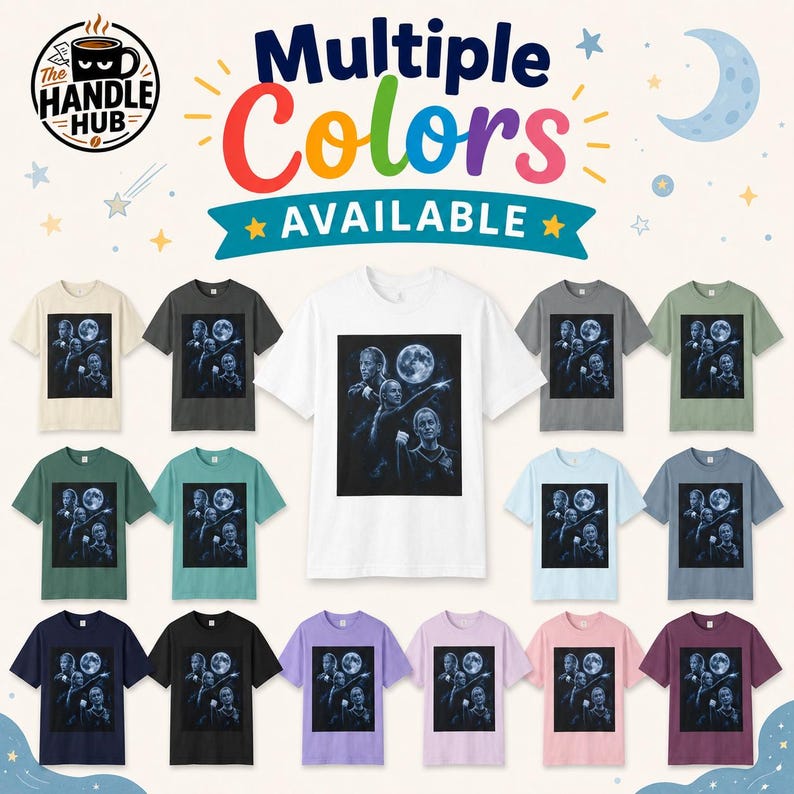 May include: A collection of short-sleeve t-shirts in various colors, each featuring a central graphic print of a person pointing toward a full moon. The text "Multiple Colors AVAILABLE" and "The Handle Hub" logo appear at the top of the image.