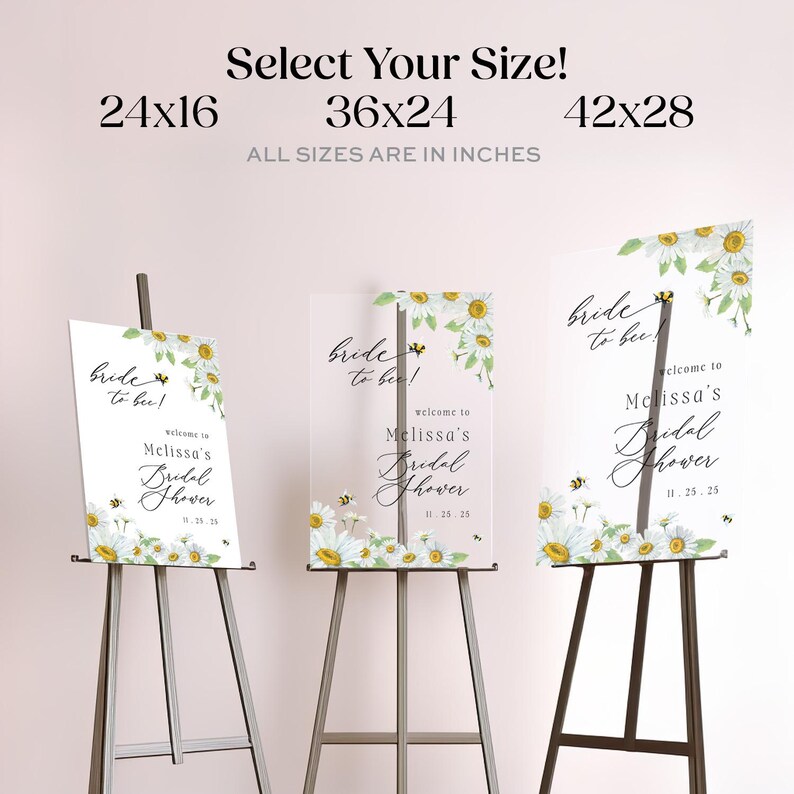 May include: Three bridal shower signs with daisy and bee graphics. The signs are on easels and display the text "Bride to bee!" and "Welcome to Melissa's Bridal Shower". Sizes available are 24x16, 36x24, and 42x28 inches.