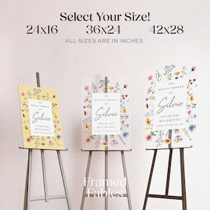 May include: Three rectangular bridal shower signs on easels with floral borders and text reading The Bridal Shower of Silvie Future Mrs McCartney. Sizes listed are 24x16, 36x24, and 42x28 inches. The signs feature colorful wildflower illustrations.